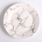 Prato de Porcelana Mármore - Elegância e Versatilidade