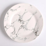 Prato de Porcelana Mármore - Elegância e Versatilidade