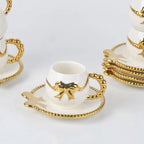 Xícara de Chá de Porcelana com Laço e Alça Dourada 90ml